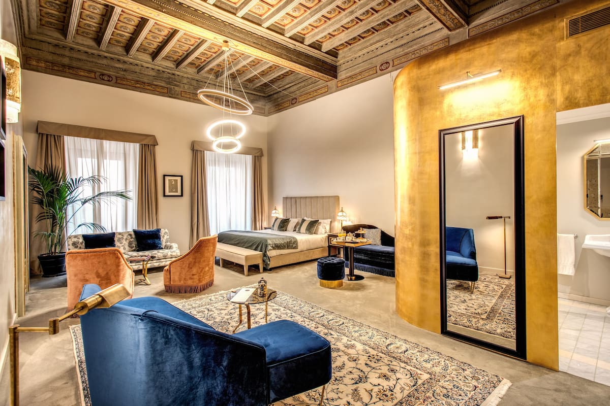 Deluxe Suite | 1 bedroom, premium bedding, down comforters, minibar