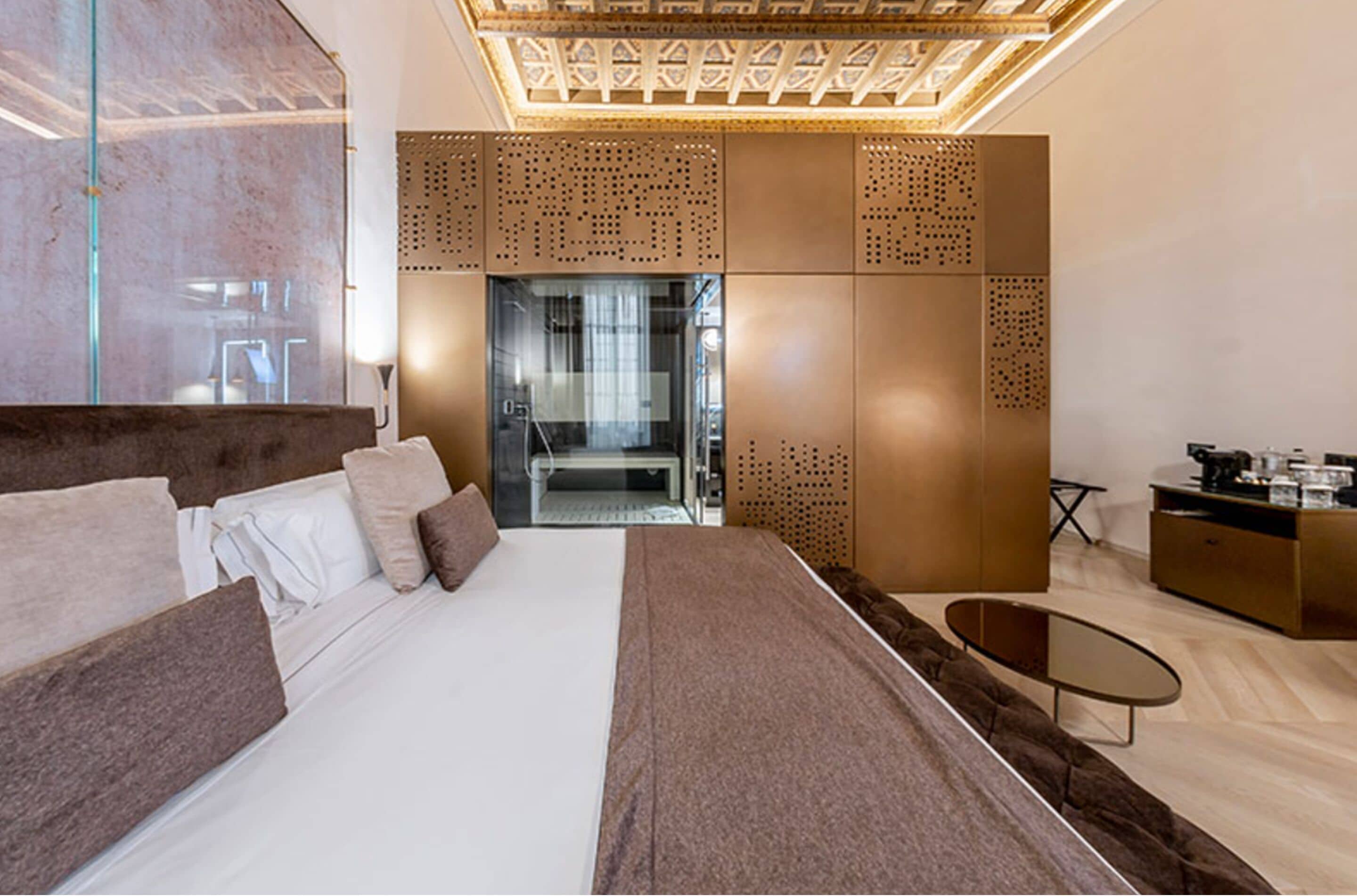 Premium bedding, down comforters, minibar, in-room safe