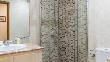 Eco-friendly toiletries, hair dryer, towels, soap