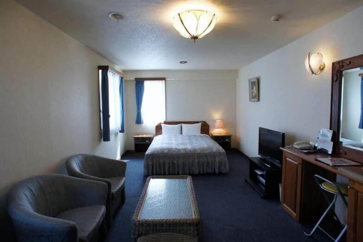 down duvets, desk, laptop workspace, blackout curtains