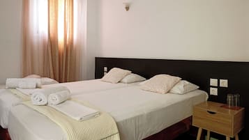 Basic Triple Room | Minibar, desk, iron/ironing board, free WiFi