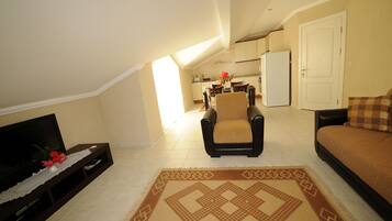 Penthouse | Woonkamer | Lcd-televisie