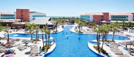 2 outdoor pools, pool umbrellas, sun loungers