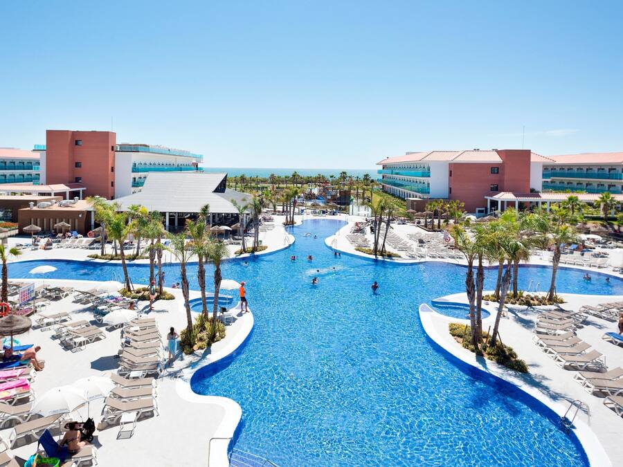 2 outdoor pools, pool umbrellas, pool loungers