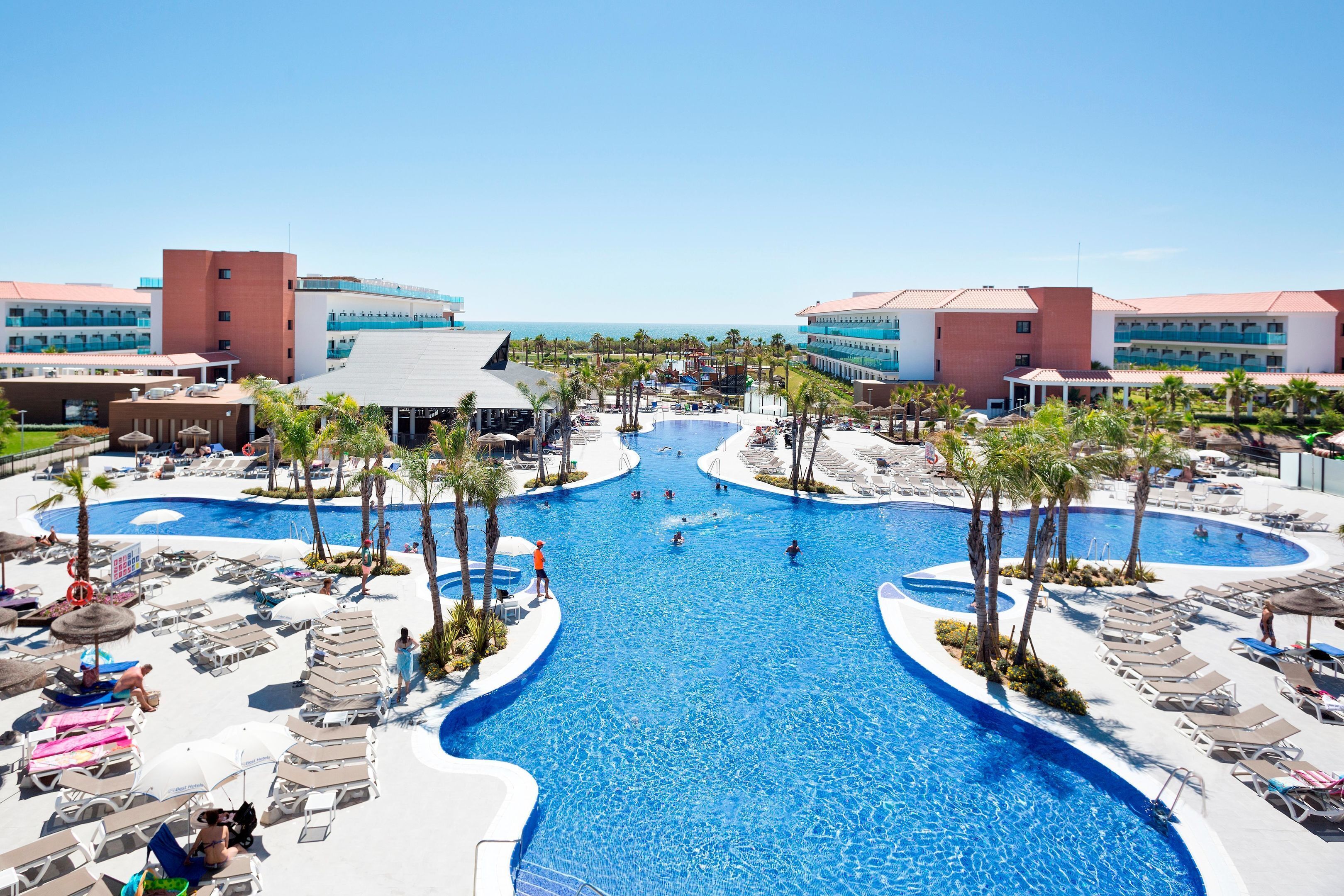 2 outdoor pools, pool umbrellas, pool loungers