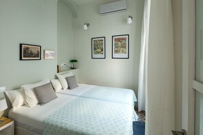 2 dormitorios, tabla de planchar con plancha, wifi y ropa de cama