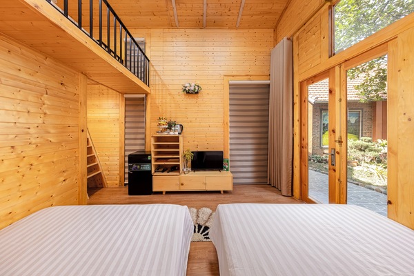 Habitación doble de lujo, 2 camas Queen size, vista al jardín | Minibar, escritorio, insonorización y wifi gratis