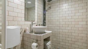 Shower, free toiletries, hair dryer, towels