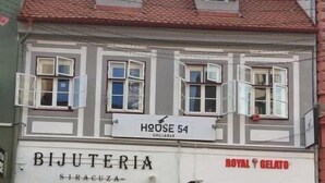 A building with a sign for 'BIJUTERIA' and 'ROYAL GELATO'. - House 54 (Brasov)