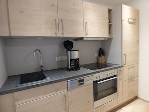 Réfrigérateur, four, plaque de cuisson, lave-vaisselle