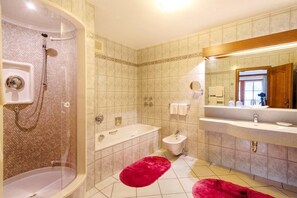 Bathtub, hair dryer, towels