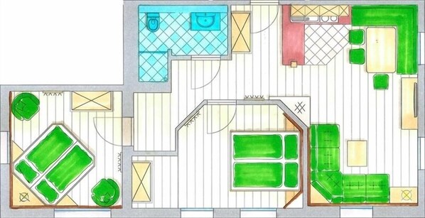 Plano de planta de un hotel con varias habitaciones, una cocina y un comedor.