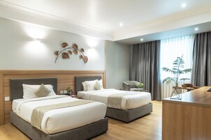 Ropa de cama de alta calidad y minibar 