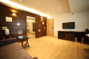 Flat-screen TV, fireplace, pay movies