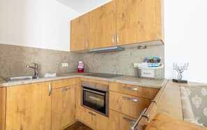 Réfrigérateur, four, plaque de cuisson, lave-vaisselle