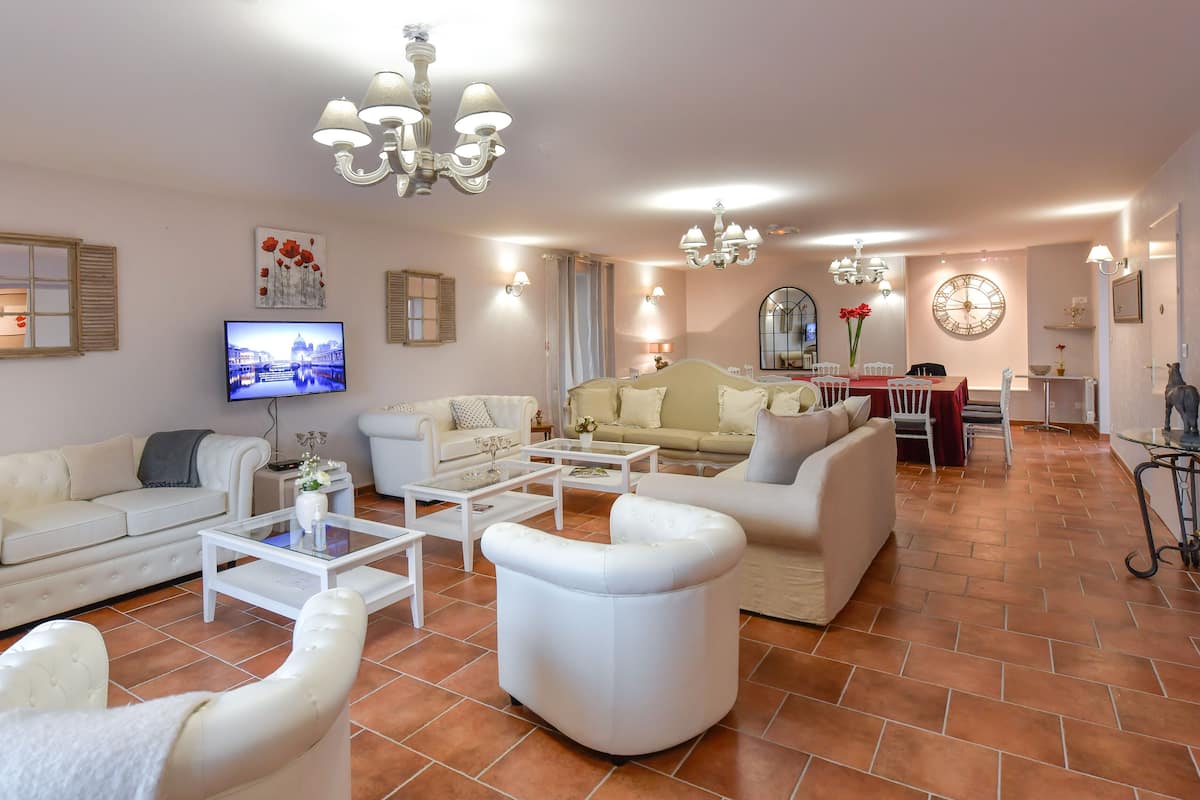 Premium Apartment, 6 Bedrooms | Living area | 60-cm flat-screen TV with digital channels, TV