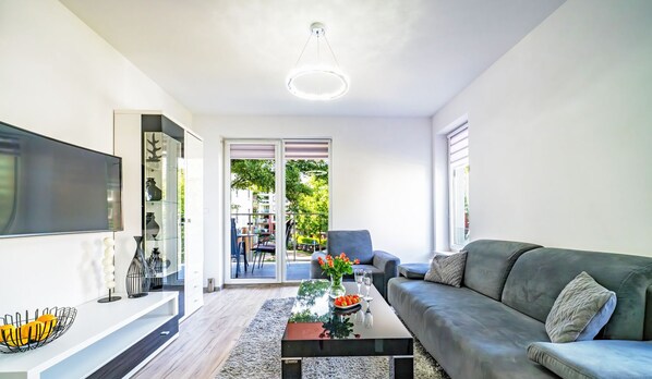 Appartement (I102) | Woonruimte | Flatscreentelevisie