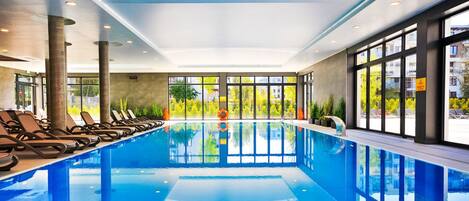 Indoor pool, open 9:00 AM to 9:00 PM, sun loungers, lifeguards on site
