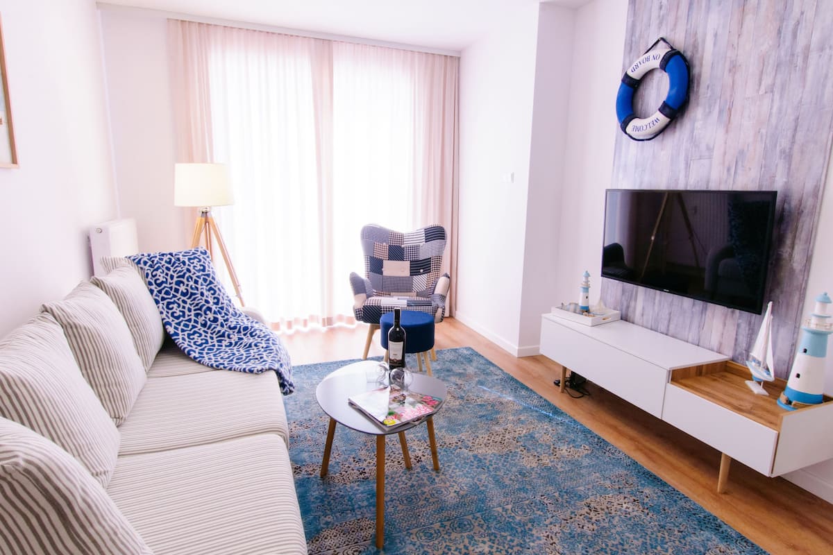 Classic Apartment, 1 Bedroom (C005) | Living area | 42-inch flat-screen TV with cable channels, TV