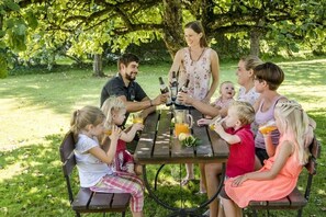 Guests can enjoy casual outdoor meals and gatherings in this family-friendly setting.