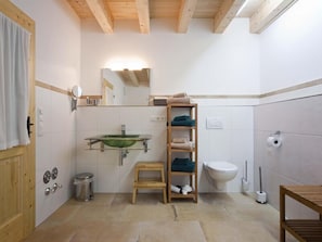 Bathtub, hair dryer, towels