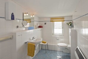 Hair dryer, towels, soap, toilet paper