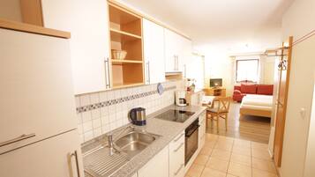 Fridge, microwave, stovetop, coffee/tea maker