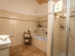 Bathtub, hair dryer, towels