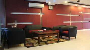 Coin salon dans le hall