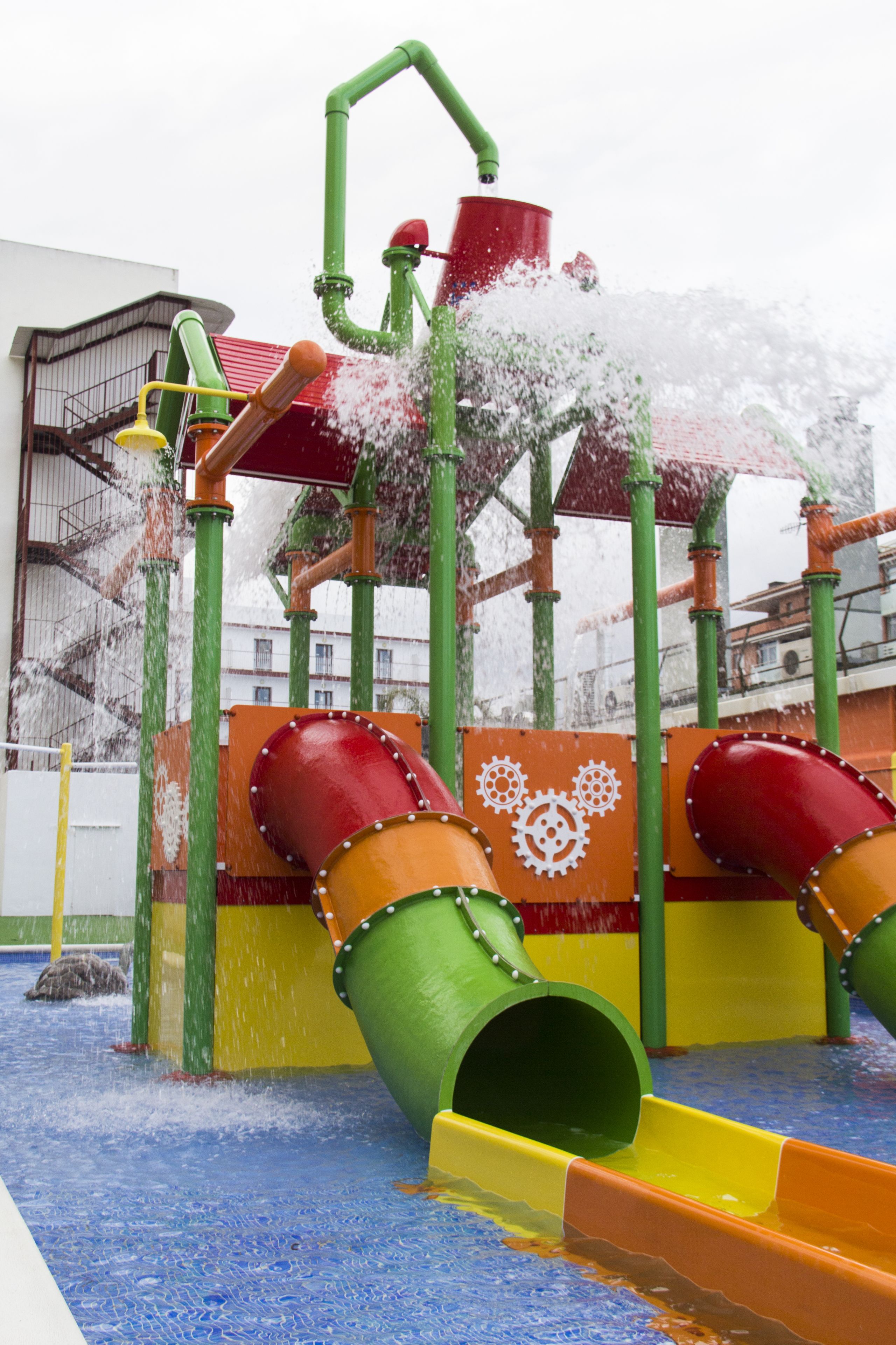 A water play area with slides and water jets.