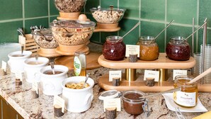 A buffet with various food items and condiments. - Apartment no. 6, 1-4 persons, 60 sqm, balcony, W-LAN, 1 bedroom and 1 children's bedroom (Ramsau bei Berchtesgaden)