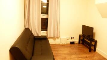 Apartment | Living area | Flat-screen TV