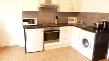 Apartment | Private kitchen | Fridge, microwave, oven, stovetop