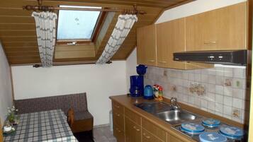 Fridge, stovetop, coffee/tea maker, toaster