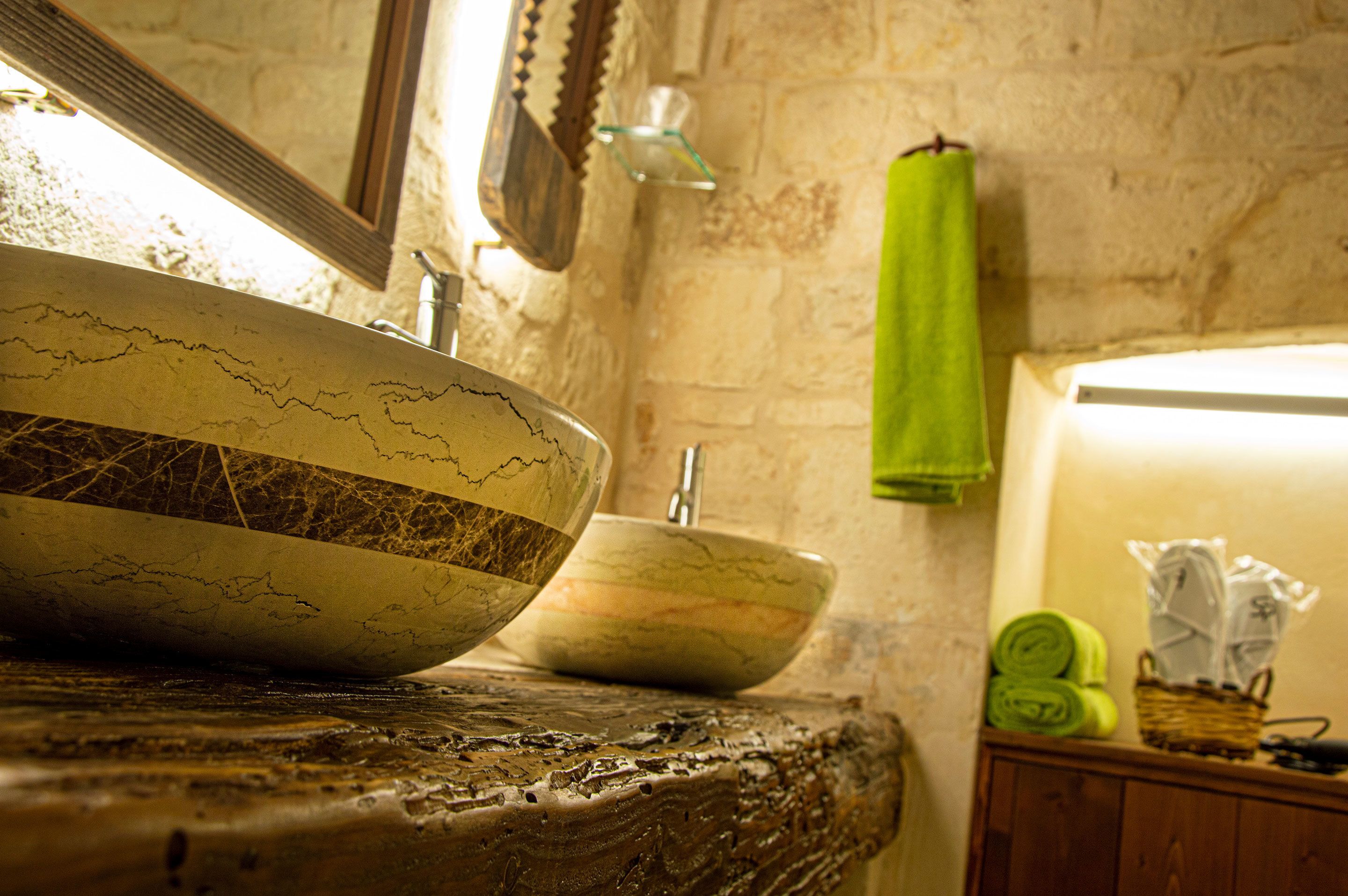 Luxury Suite, 1 King Bed, Private Bathroom | Bathroom | Shower, rainfall showerhead, designer toiletries, hair dryer