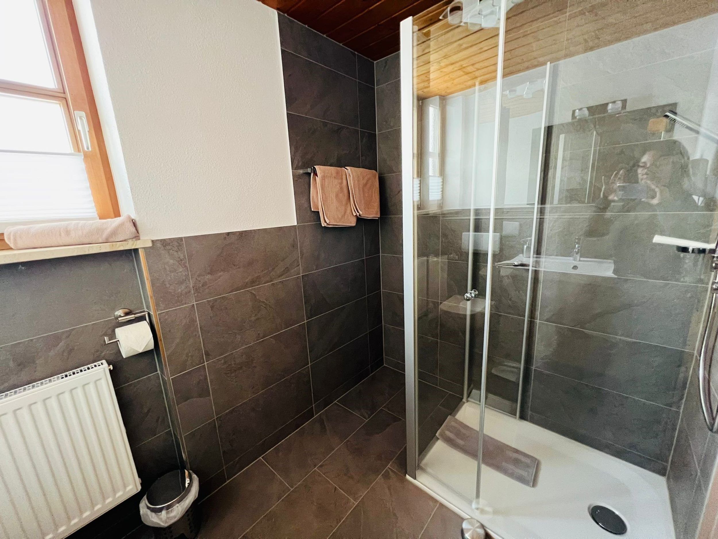 Bathtub, hair dryer, towels