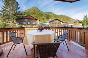 Enjoy a romantic meal for two on this outdoor terrace overlooking the breathtaking mountain landscape.