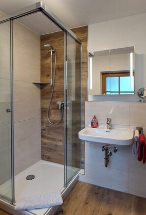 Bathtub, hair dryer, towels