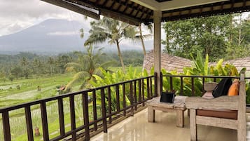 Deluxe Room, 1 King Bed, Mountain View, Garden Area | Balcony