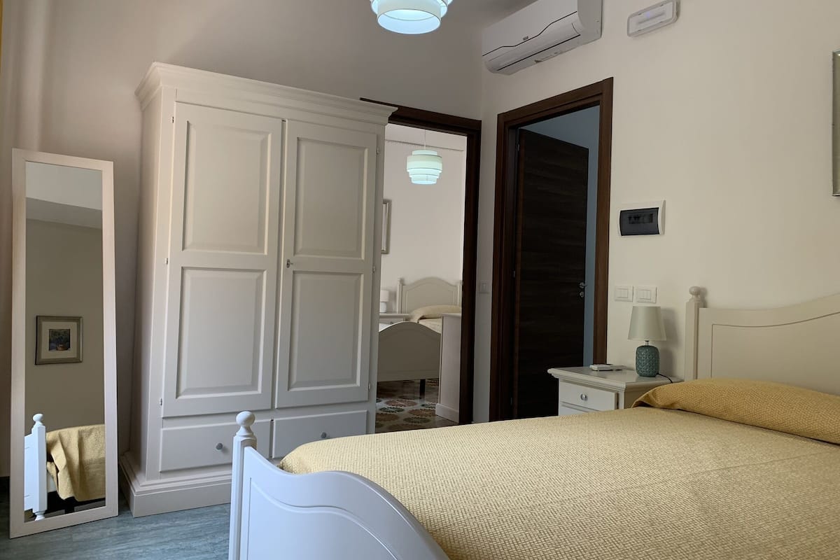 Standard Quadruple Room, 2 Bedrooms, Ensuite | Minibar, in-room safe, desk, laptop workspace