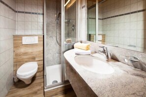 Shower, free toiletries, hair dryer, bathrobes