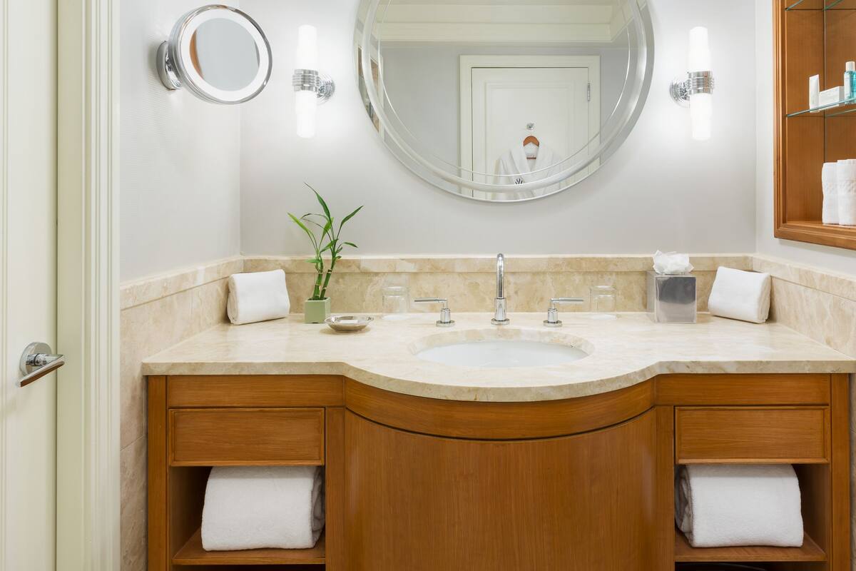 Separate bathtub and shower, designer toiletries, hair dryer, bathrobes