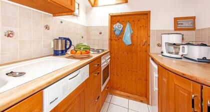 Ferienwohnung Loferau 4 - 47 m² für 2-3 Personen, 1 Schlafzimmer, Wohnküche mit Sitzgruppe und Süd-Balkon