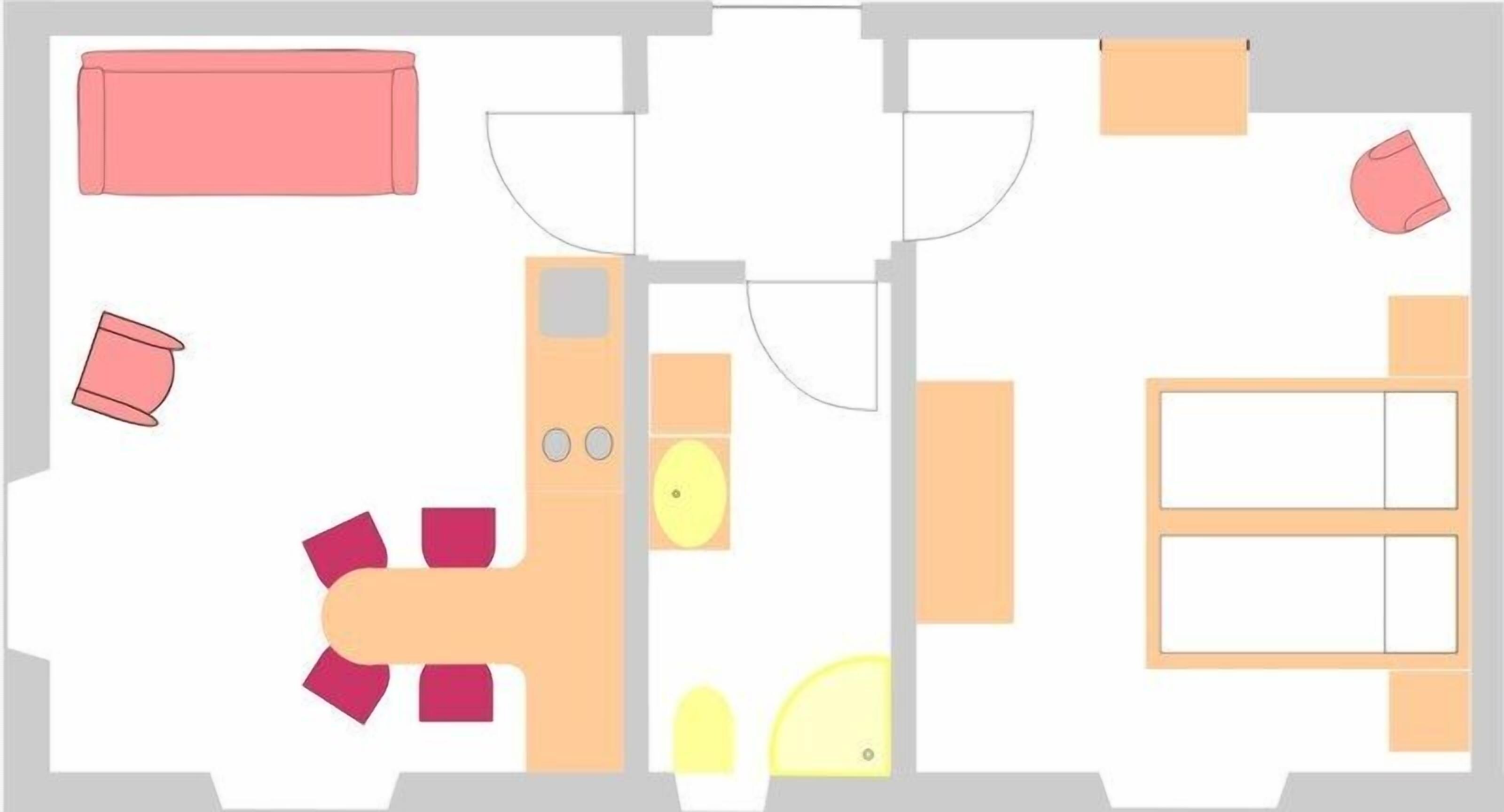 A floor plan with a kitchen, dining area, and two bedrooms.