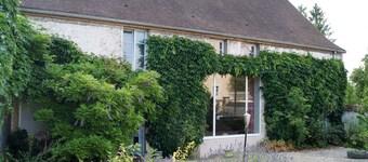 Lovely guest room that can accommodate 3 guests and a cot.