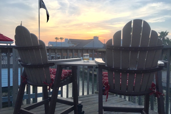 Casa FRIO Sunset views from comfortable Polywood deck high chairs.