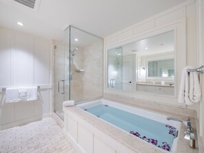 Combined shower/tub, hair dryer, towels, soap