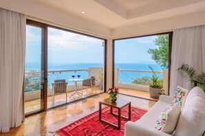 Suite Deluxe, 1 cama King size, vista al océano | Ropa de cama de alta calidad y camas con efecto memoria 