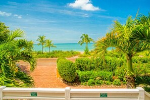 On the beach, sun-loungers, beach towels