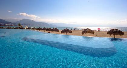 Condo sur la plage avec télévision par cùble<br> AccÚs aux piscines, gymnase, court de tennis